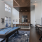 Game room with billiards and shuffleboard at Velo Riverside Apartments in Dayton, KY
