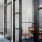 private offices with glass doors at Velo Riverside Apartments in Dayton, KY