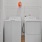washer and dryer in a closet at Velo Riverside Apartments in Dayton, KY