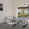 outdoor patio with a ping pong table and a tv at Velo Riverside Apartments in Dayton, KY