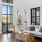 a lounge with a couch table and chair at Velo Riverside Apartments in Dayton, KY