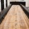shuffleboard table at Velo Riverside Apartments in Dayton, KY