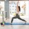 a person doing yoga in a gym at Velo Riverside Apartments in Dayton, KY